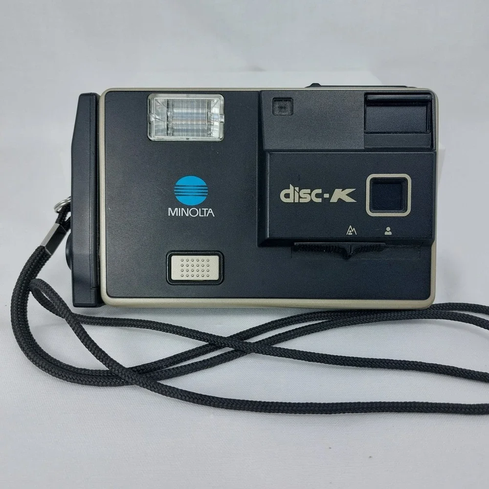 Minolta Disc-K 2509879 Camera With‎ Flash Rope Lanyard
